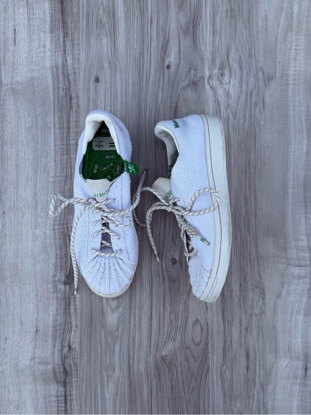 Adidas PW Humanrace Primeknit sneakers in white.